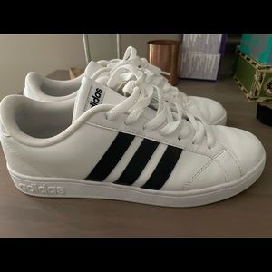 Classic white adidas with 3 black stripes size 8.5